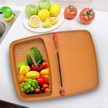 Thick plastic kitchen tray with slicing and cutting features.