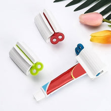 Rolling tube toothpaste squeezer in a sleek design for efficient use.