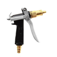 Close-up of high-pressure spray gun trigger and nozzle