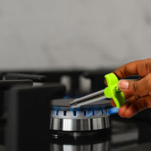 Ganesh lighter with integrated knife and peeler