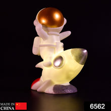 Resin astronaut figure for desktop decoration.